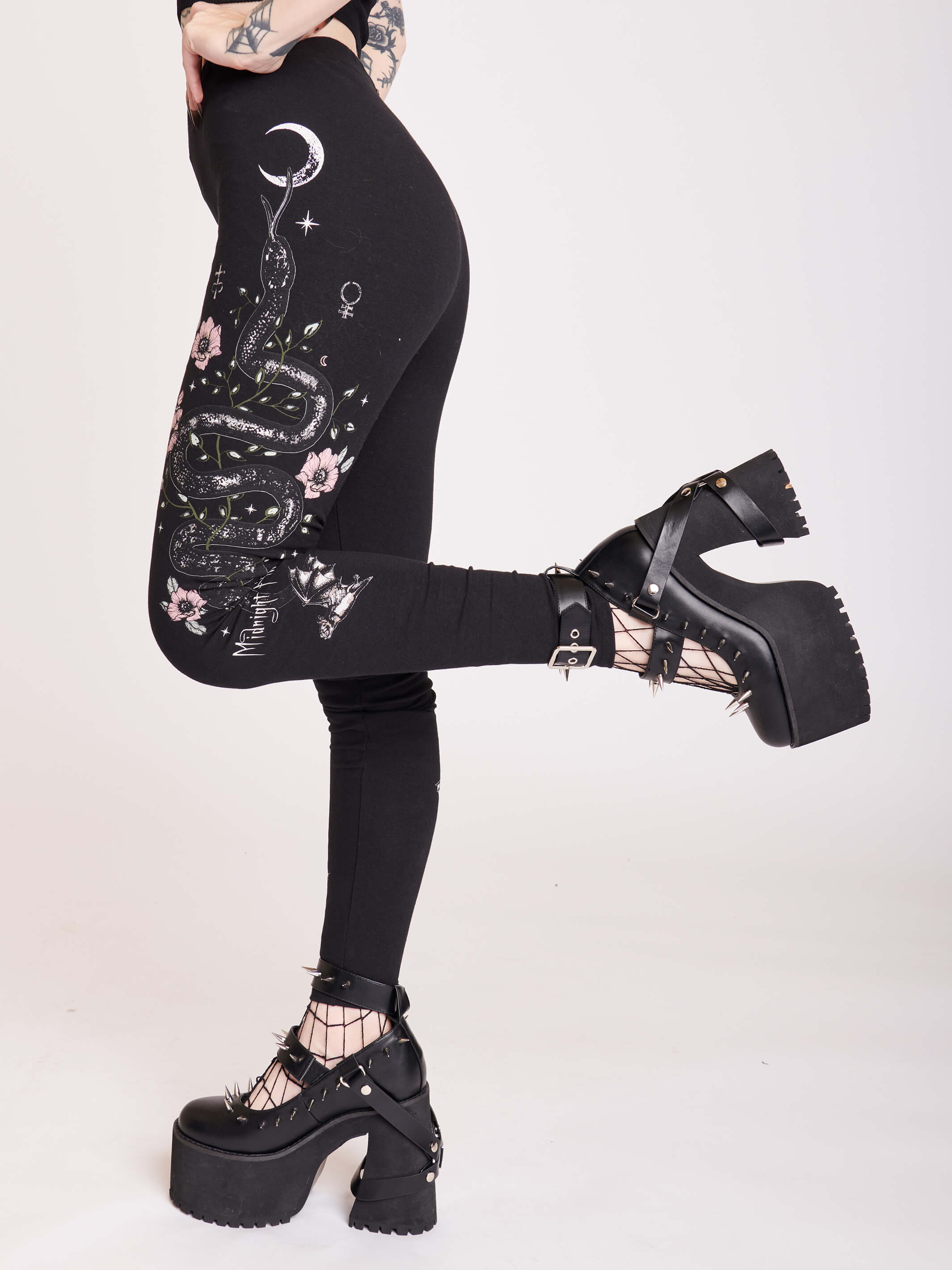 Black legging with snake and flower graphic