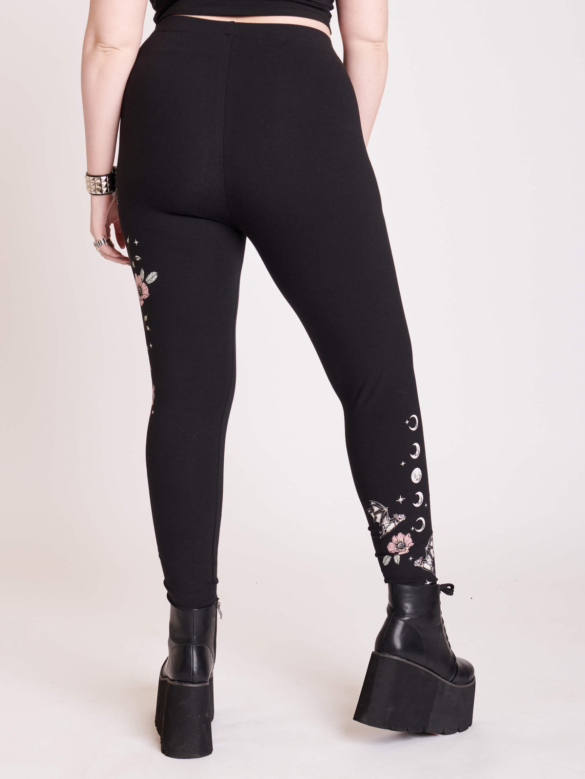 Black legging with snake and flower graphic