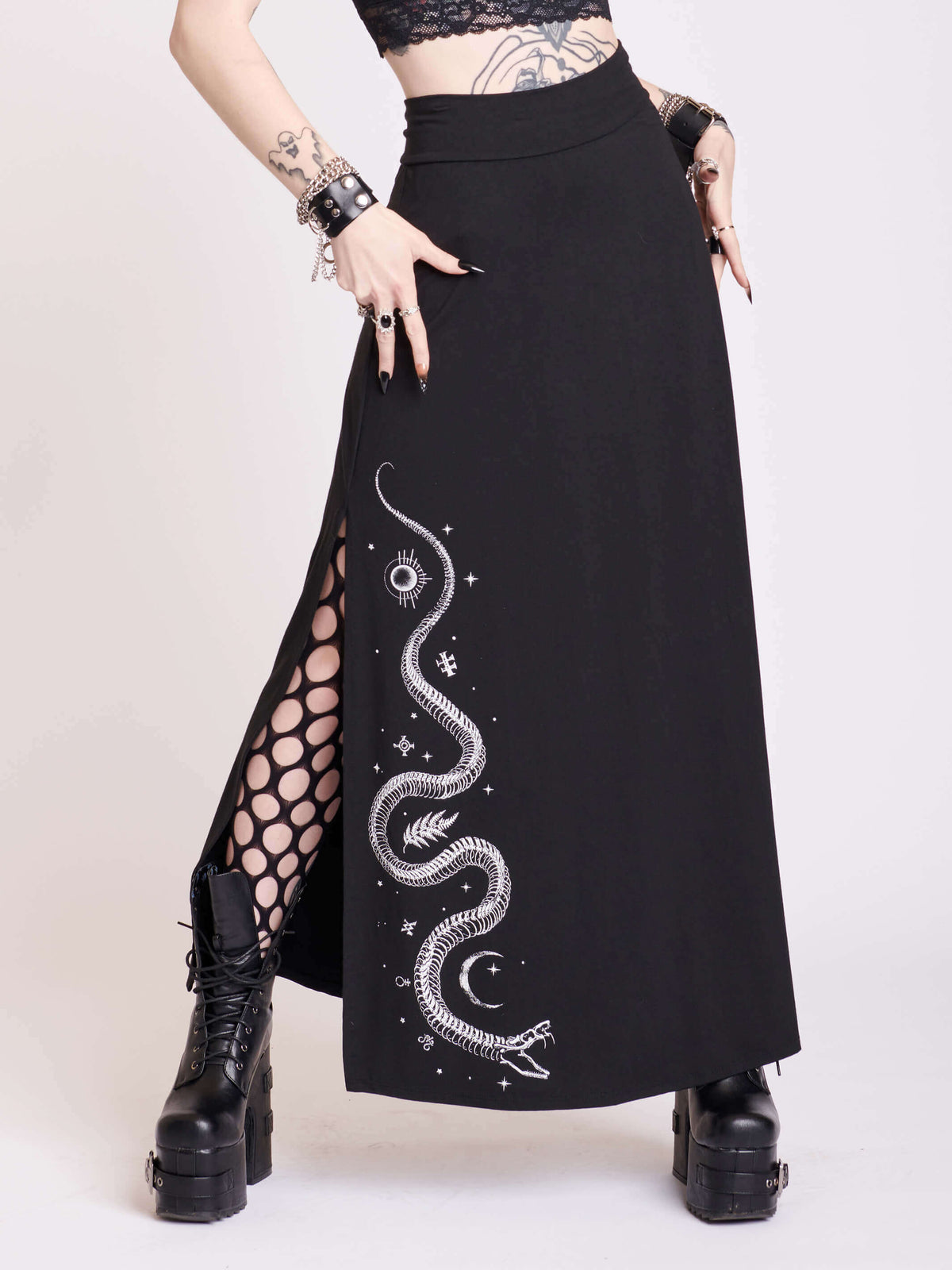 Black skirt with side split and skeleton snake graphic