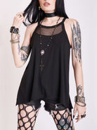 black tank with sheer back panel embroidered with spine motif