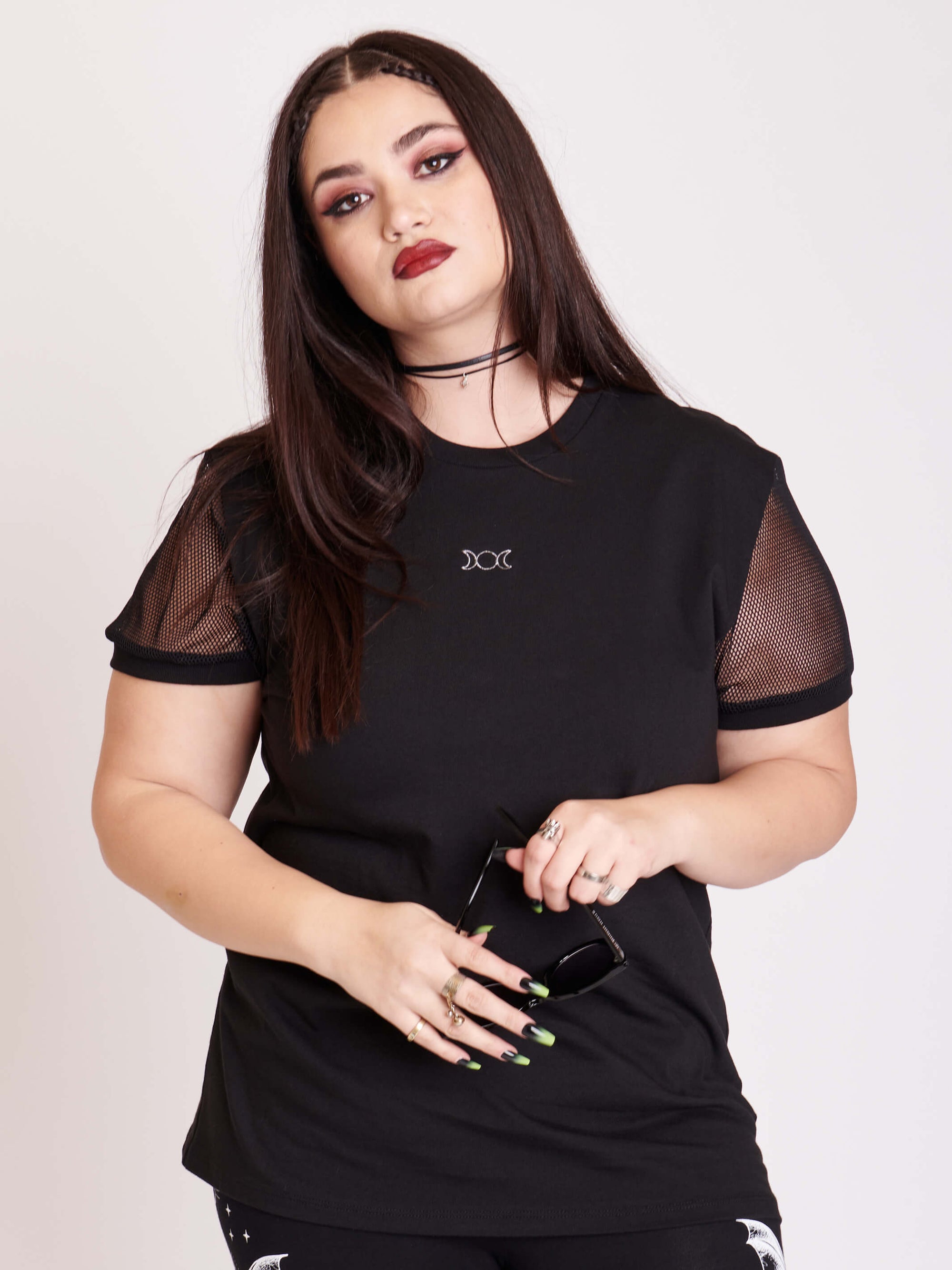 100% cotton unisex fit t-shirt with fishnet sleeve details and metallic triple moon embroidery.