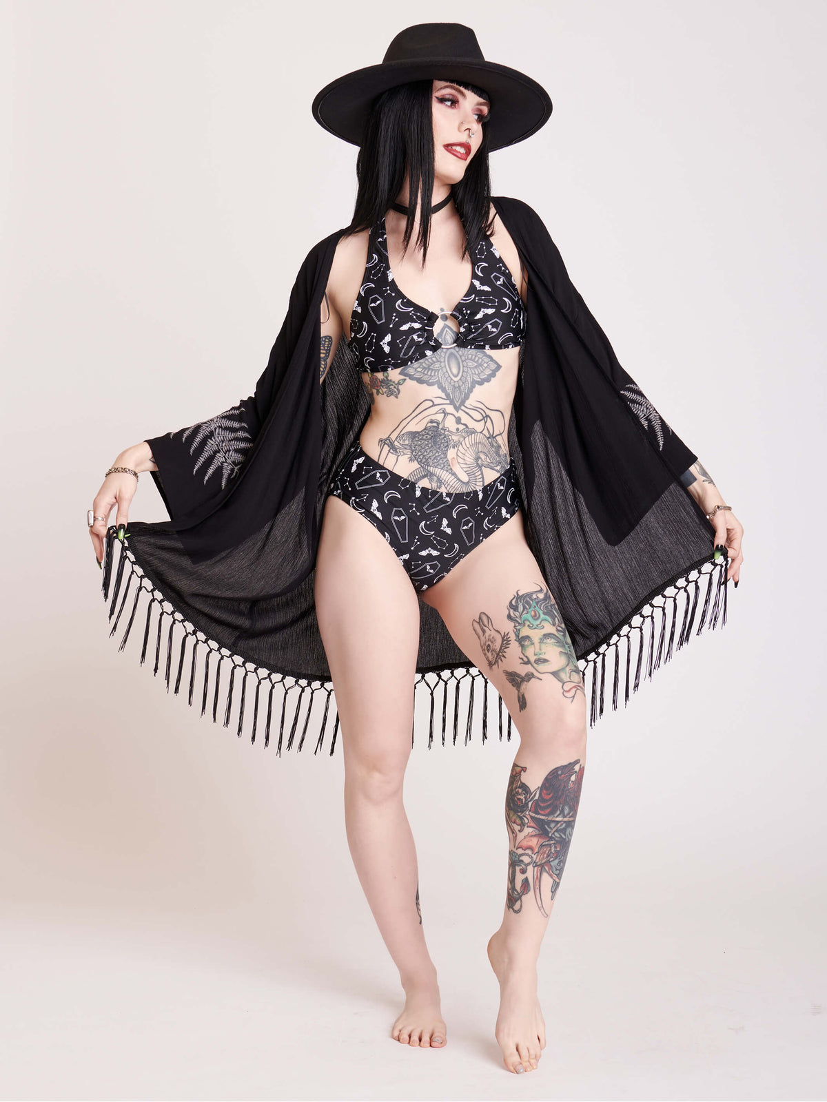BLACK SWIM BOTTOMS WITH WHITE BATS AND COFFIN PRINT