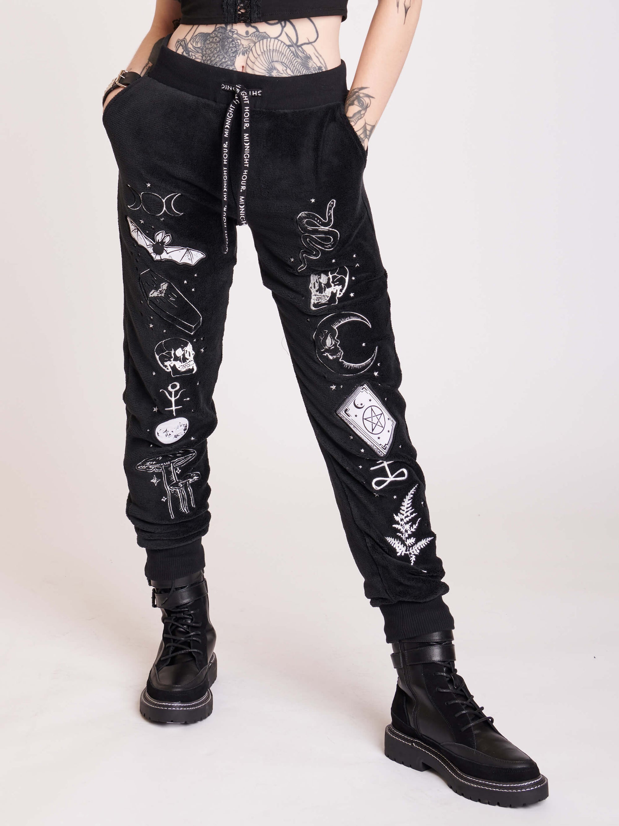 Super soft joggers with embroidered witchy graphics
