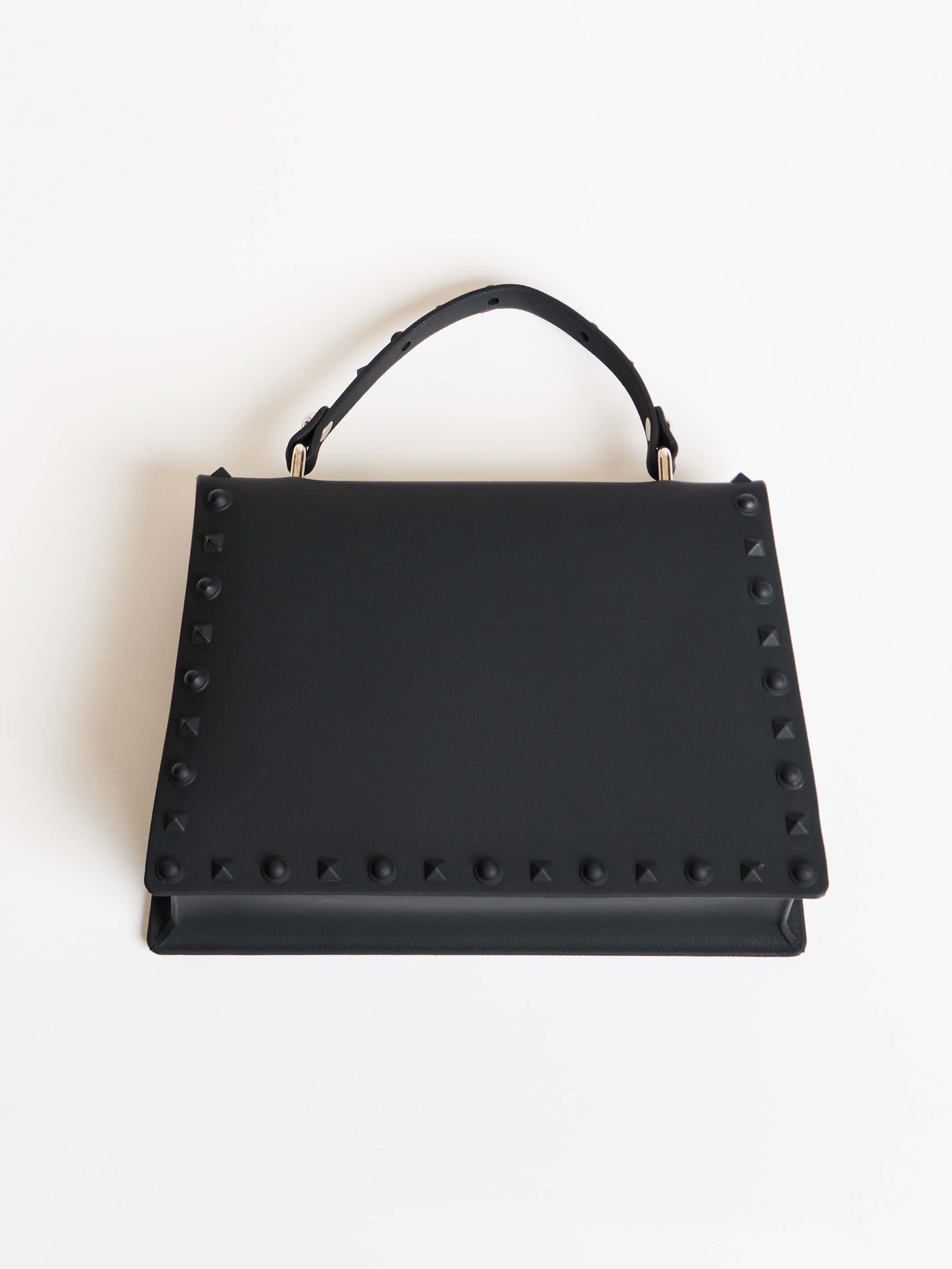 black rubber studded purse