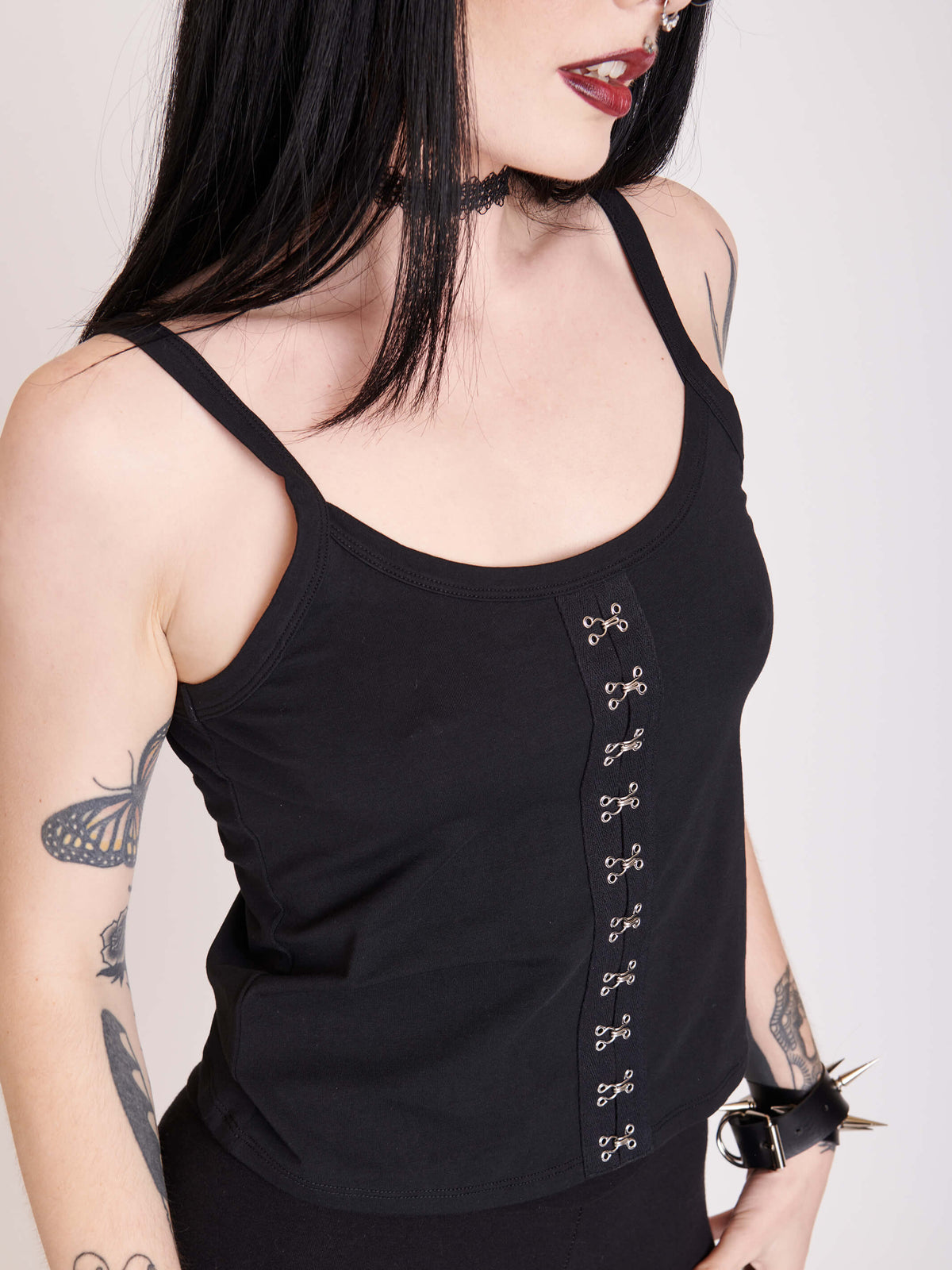 Black cami with hook and eye detail down center front